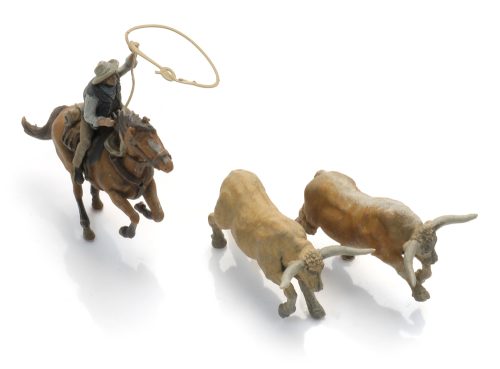 5870170 Cowboy vangt Longhorns met lasso